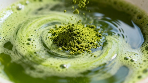 Matcha powder dissolving in water for a smooth brew.