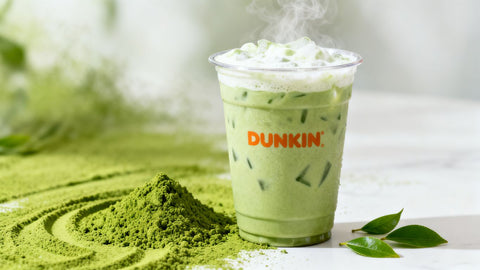 Dunkin' matcha latte with matcha powder and leaves.